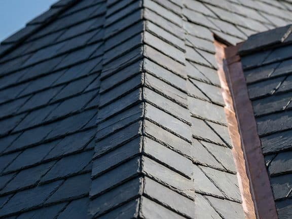 Detail of precise shingle coursing at a ridge line